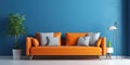 Interior with orange sofa in modern living room with blue mockup wall, home design Royalty Free Stock Photo