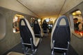 Interior of a passenger helicopter salon, seats and window shades