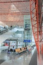 Interior with passenger seats and elevator, Beijing Capital International Airport. Royalty Free Stock Photo