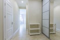 Interior photo corridor entrance to the apartment with a large white closet Royalty Free Stock Photo