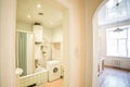 Interior photography, bathroom. Tidy white bathroom for convenient living. City accomodations interior. Royalty Free Stock Photo