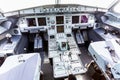 Interior of pilot cabine in actual modern passenger jet airplane Airbus A319. Many buttons,