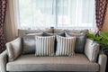 A interior piture of gray fabric pillows on gray fabric sofa wit Royalty Free Stock Photo