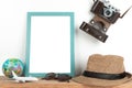 Interior poster mock up with vertical wooden frame, travel theme, on white wall background