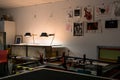 Interior of print artists studio showing workin areas in low light. Royalty Free Stock Photo