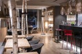 Interior of pub with sitting arrangement in stylish restaurant at luxurious resort