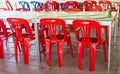 Interior of public dining area with colourul plastic chairs and tables Royalty Free Stock Photo