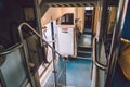 Interior of railway passenger car of the second class in train in Lombardy in Italy September 27, 2019. Train interior. Blue seats