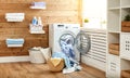 Interior of real laundry room with washing machine at window at Royalty Free Stock Photo