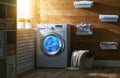 Interior of real laundry room with washing machine at window at Royalty Free Stock Photo