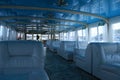 The interior of the recreation area on a pleasure boat in shades of blue. Royalty Free Stock Photo