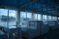 The interior of the recreation area on a pleasure boat in shades of blue. Royalty Free Stock Photo