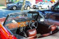 Interior of red convertible jaguar designed of left side driving parked on street on Bribie Island Queensland Australia circa 9-2