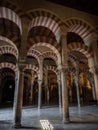 Interior red white striped architecture of Mezquita islamic mosque catholic church Cathedral Cordoba Andalusia Spain Royalty Free Stock Photo