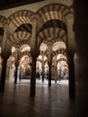 Interior red white striped architecture of Mezquita islamic mosque catholic church Cathedral Cordoba Andalusia Spain Royalty Free Stock Photo