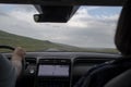 Interior of a rental car driving with Ring Road landscape in Iceland