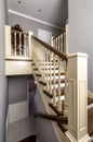 Interior of residential house. Staircase to second floor closeup. Home interior design in classic style