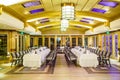 Interior of the restaurant with covered tables Royalty Free Stock Photo