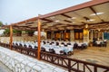 Interior of the restaurant with covered tables Royalty Free Stock Photo