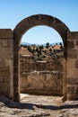 Interior of romanesque church Ermita de San Frutos. Abandoned hermitage built on top of a hill among cliffs. Round arch still Royalty Free Stock Photo