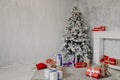 Interior of the room with the Christmas tree and Christmas gifts Royalty Free Stock Photo
