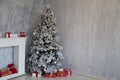 Interior of the room with the Christmas tree and Christmas gifts Royalty Free Stock Photo