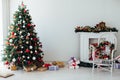 Interior room with Christmas tree window with new year gifts Royalty Free Stock Photo