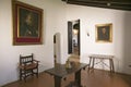 Interior room with paintings of Christopher Columbus and his sponsor, Spanish Queen Isabella, as seen at the 15th-century