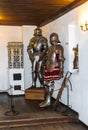 Interior rooms of the medieval Bran Castle in Romania. Antique Knight Armor at Dracula`s Castle Royalty Free Stock Photo