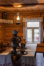 Interior of russian traditional wooden house with russian kettle Samovar Royalty Free Stock Photo