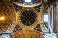 Interior of Saint Peter's Basilica in Rome, Italy with luxurious vaulted and gilded ceilings Royalty Free Stock Photo