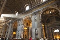 Interior of Saint Peters basilica with a ray of light from the window