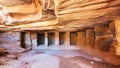 Interior of sandstone rock-cut tombs in Petra town