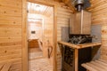 Interior of sauna. rural mobile wooden bath in the form of a barrel in a pine forest Royalty Free Stock Photo