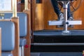 Interior seating of old wooden ferry boat with seating and captains chair