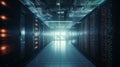 Interior of a server room, where server towers are visible on the left and right sides and a corridor runs through the center. Royalty Free Stock Photo