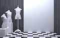 Interior of a sewing workshop or clothing store with a tailor mannequin. White wall showcase with copy space. The room of a Royalty Free Stock Photo