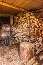 Interior of a shed for storing and drying firewood for the winter Royalty Free Stock Photo