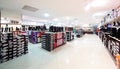 Interior of shoe store in modern european mall Royalty Free Stock Photo