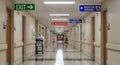 Hospital Hallway Signs Exit, Emergency Assembly, Fire Extinguisher Royalty Free Stock Photo