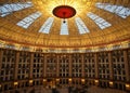 Interior shot of a majestic dome-shaped ceiling with multiple light fixtures