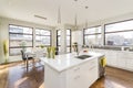 Interior shot of a modern house kitchen with large windows Royalty Free Stock Photo