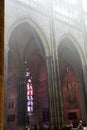 Interior shot of St. Vitus Cathedral in Prague, a gothic style arches and stained glass Royalty Free Stock Photo