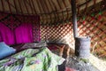 Interior shot of a traditional yurt with stove at Song Kul lake