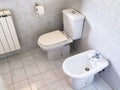 Interior of simple white toilet room Royalty Free Stock Photo