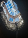 Interior skylight in a building with columns and sculpture