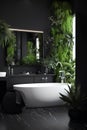 Interior of small bathroom in black and white colors with green decorative plants in modern house Royalty Free Stock Photo