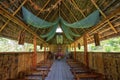 Interior of a small church built from bamboo in Ecuador