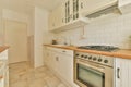 The interior of a small kitchen in white tones Royalty Free Stock Photo