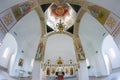 The interior of a small Orthodox church.
